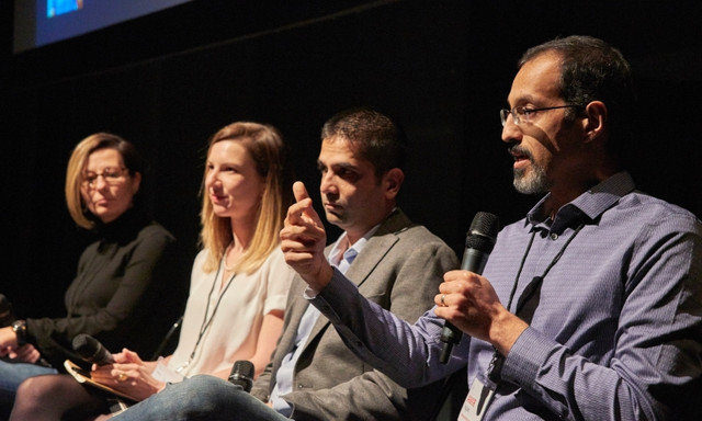 Dr. Hajian in front of the Green Bank Telescope, the largest steerable radio telescope on Earth.
